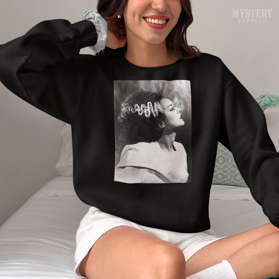 Bride of Frankenstein 1935 Vintage Horror Movie Monster Black and White Elsa Lanchester Profile Photo reproduction Mens Womens Unisex Heavy Blend Crewneck Sweatshirt from Mystery Supply Co. @mysterysupplyco