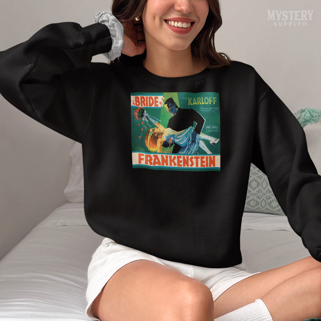 Bride of Frankenstein 1935 vintage promotional illustration horror monster movie poster reproduction Mens Womens Unisex Heavy Blend Crewneck Sweatshirt from Mystery Supply Co. @mysterysupplyco