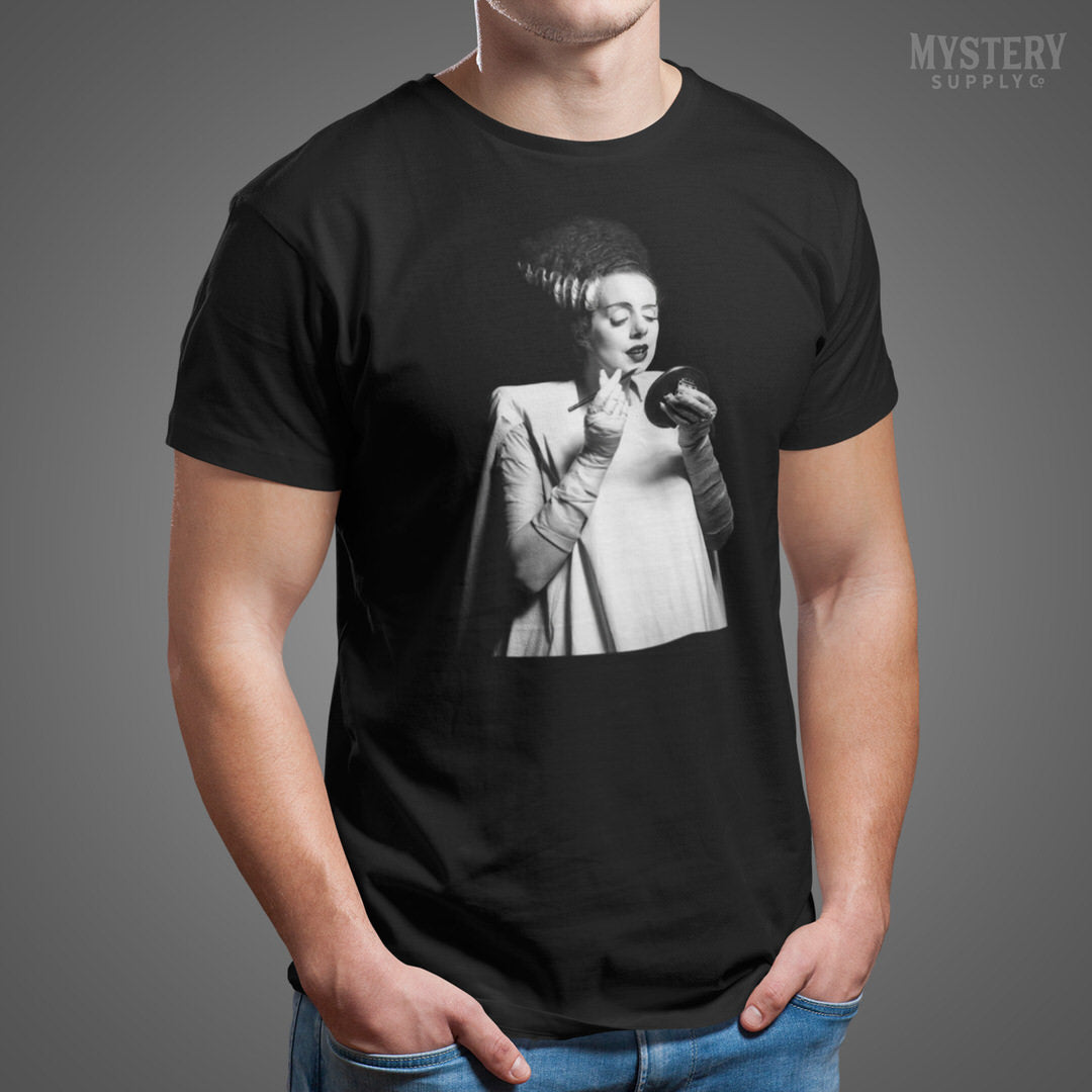 Bride of Frankenstein 1935 Vintage Horror Movie Monster Black and White Makeup Lipstick Behind the Scenes Photo Mens Womens Unisex T-Shirt from Mystery Supply Co. @mysterysupplyco