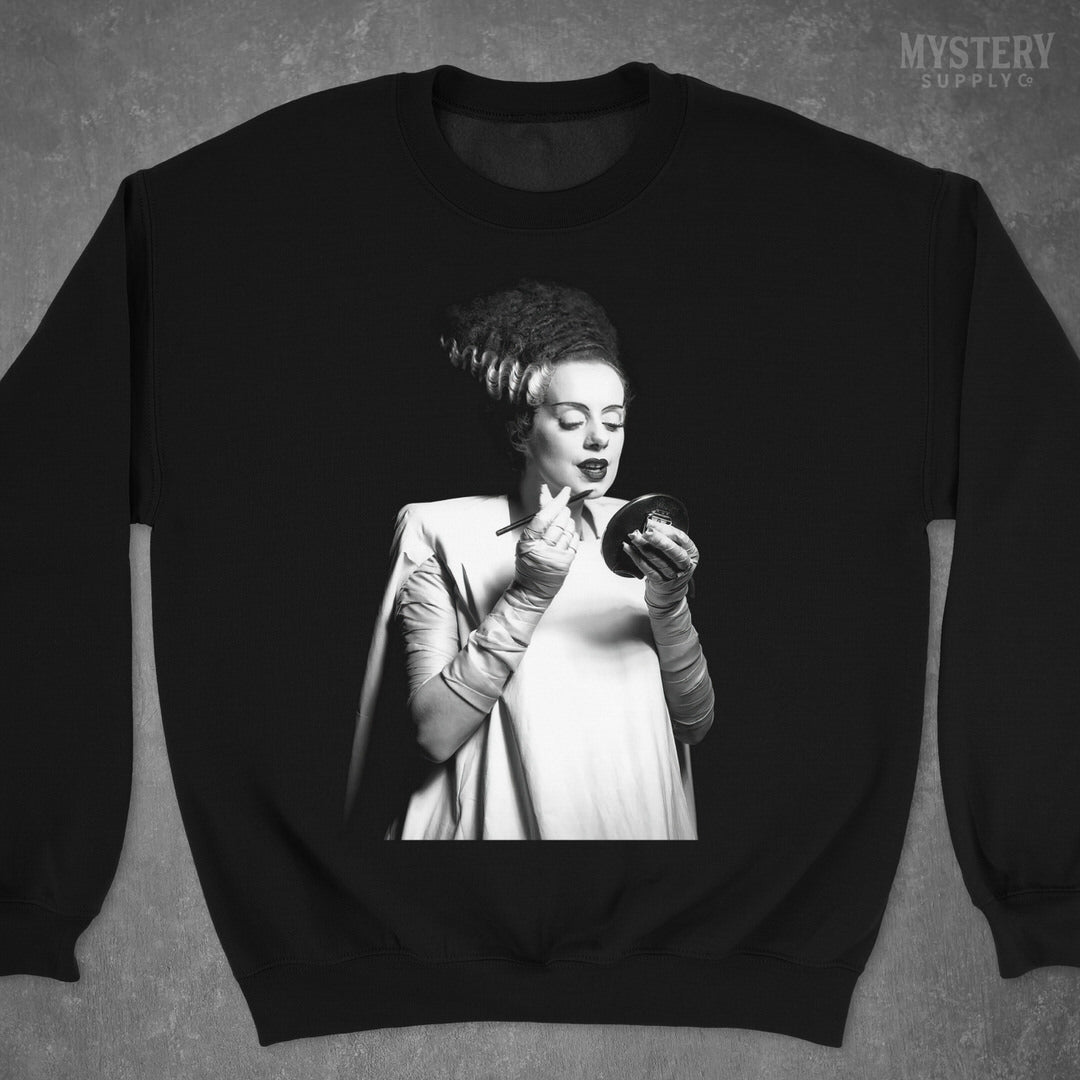 Bride of Frankenstein 1935 Vintage Horror Movie Monster Black and White Makeup Lipstick Behind the Scenes Photo Mens Womens Unisex Heavy Blend Crewneck Sweatshirt from Mystery Supply Co. @mysterysupplyco