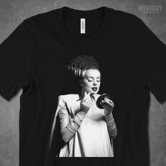 Bride of Frankenstein 1935 Vintage Horror Movie Monster Black and White Makeup Lipstick Behind the Scenes Photo Mens Womens Unisex T-Shirt from Mystery Supply Co. @mysterysupplyco