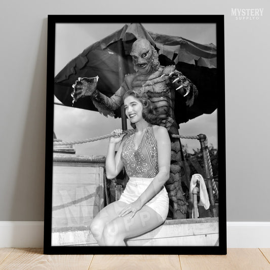 Creature from the Black Lagoon 1954 vintage horror monster sneaking behind Julie Adams as Kay and the gill man black and white photo reproduction from Mystery Supply Co. @mysterysupplyco