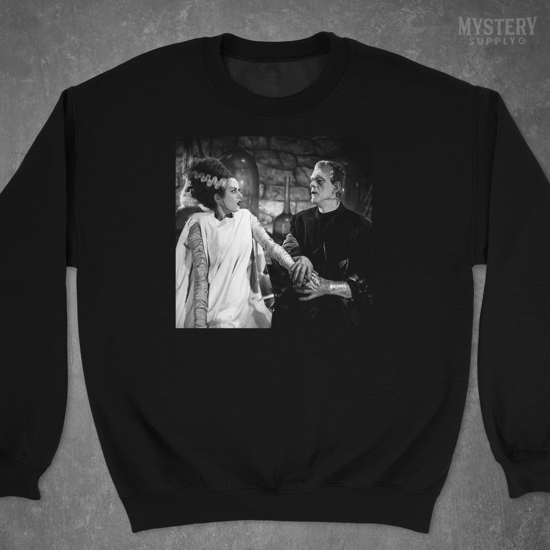 Bride of Frankenstein 1935 Vintage Horror Movie Monster Couple Black and White Photo reproduction Mens Womens Unisex Heavy Blend Crewneck Sweatshirt from Mystery Supply Co. @mysterysupplyco