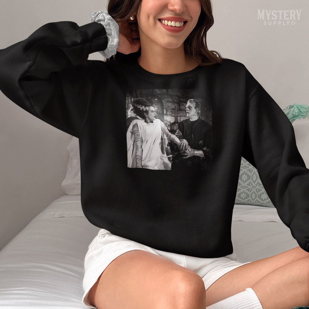 Bride of Frankenstein 1935 Vintage Horror Movie Monster Couple Black and White Photo reproduction Mens Womens Unisex Heavy Blend Crewneck Sweatshirt from Mystery Supply Co. @mysterysupplyco