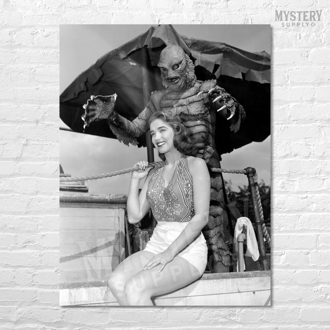 Creature from the Black Lagoon 1954 vintage horror monster sneaking behind Julie Adams as Kay and the gill man black and white photo reproduction from Mystery Supply Co. @mysterysupplyco