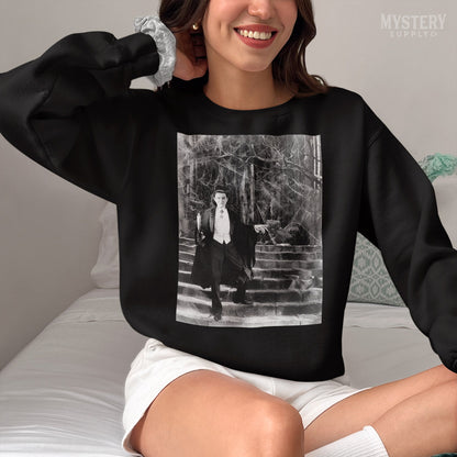 Dracula 1930s Vintage Bela Lugosi Horror Movie Vampire Monster Spooky Candle Steps Cobwebs Black and White Photo reproduction Mens Womens Unisex Heavy Blend Crewneck Sweatshirt from Mystery Supply Co. @mysterysupplyco