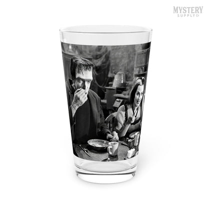 Herman and Lily Munster 1960s Vintage The Munsters Frankenstein Vampire Horror Monster Couple Black and White Photo reproduction 16oz pint glass home decor glassware from Mystery Supply Co. @mysterysupplyco