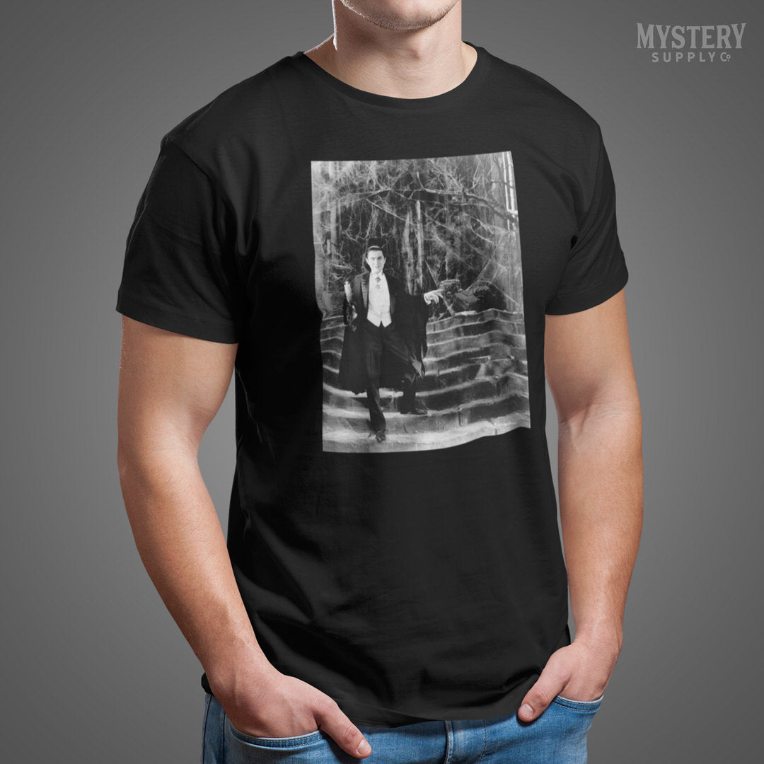 Dracula 1930s Vintage Bela Lugosi Horror Movie Vampire Monster Spooky Candle Steps Cobwebs Black and White Photo reproduction mens womens unisex crew neck t-shirt from Mystery Supply Co. @mysterysupplyco