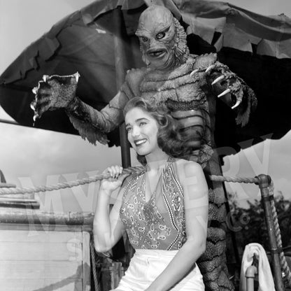 Creature from the Black Lagoon 1954 vintage horror monster sneaking behind Julie Adams as Kay and the gill man black and white photo reproduction from Mystery Supply Co. @mysterysupplyco