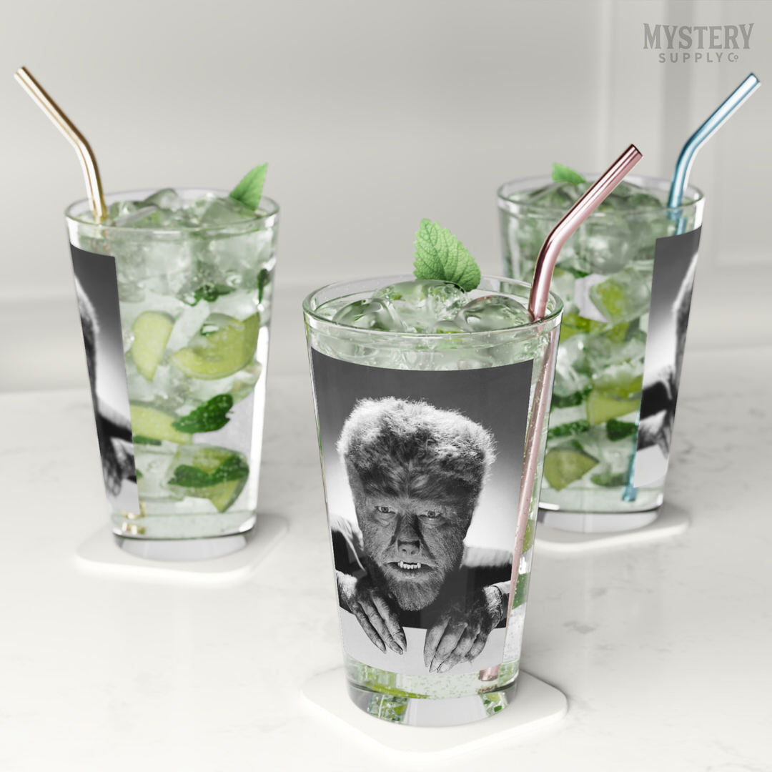 The Wolf Man 1941 Vintage Horror Movie Monster Lon Chaney Jr. Werewolf fangs and claws Black and White photo reproduction 16oz clear pint glass home decor glassware from Mystery Supply Co. @mysterysupplyco
