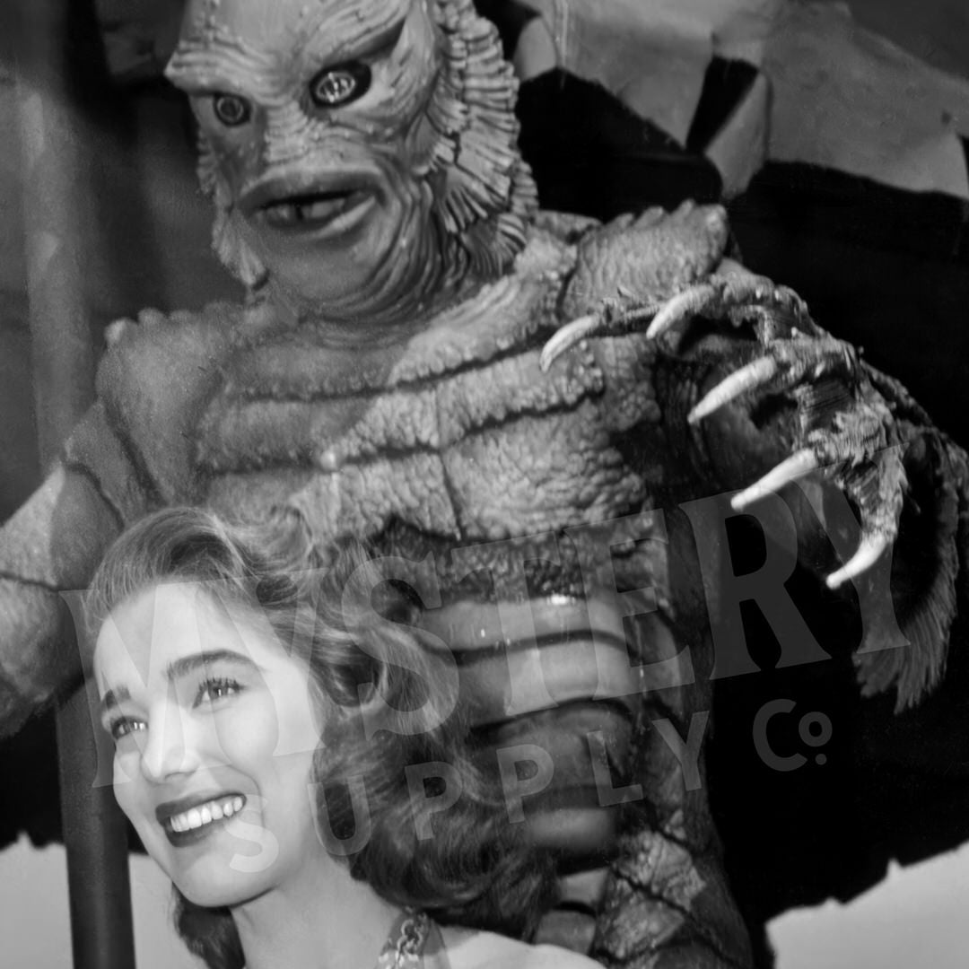 Creature from the Black Lagoon 1954 vintage horror monster sneaking behind Julie Adams as Kay and the gill man black and white photo reproduction from Mystery Supply Co. @mysterysupplyco