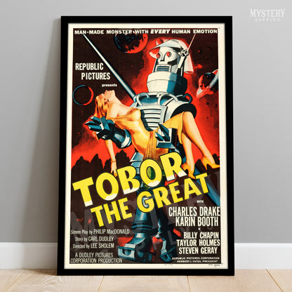 Vintage movie poster for 'Tobor the Great' with a robot and woman on a red background. From Mystery Supply Co..
