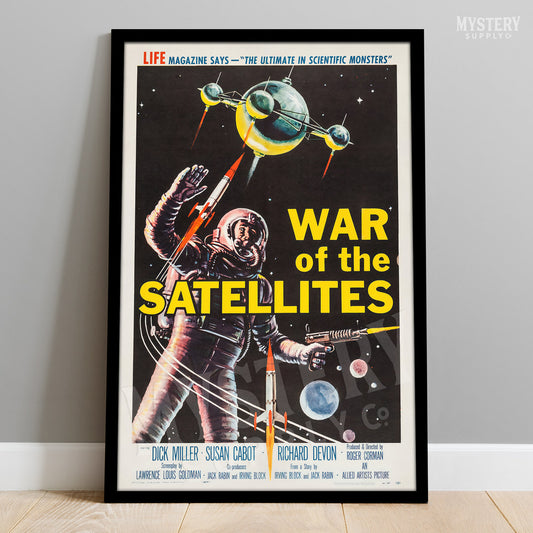 Framed movie poster for 'War of the Satellites' with an astronaut and satellite imagery. From Mystery Supply Co. @mysterysupplyco