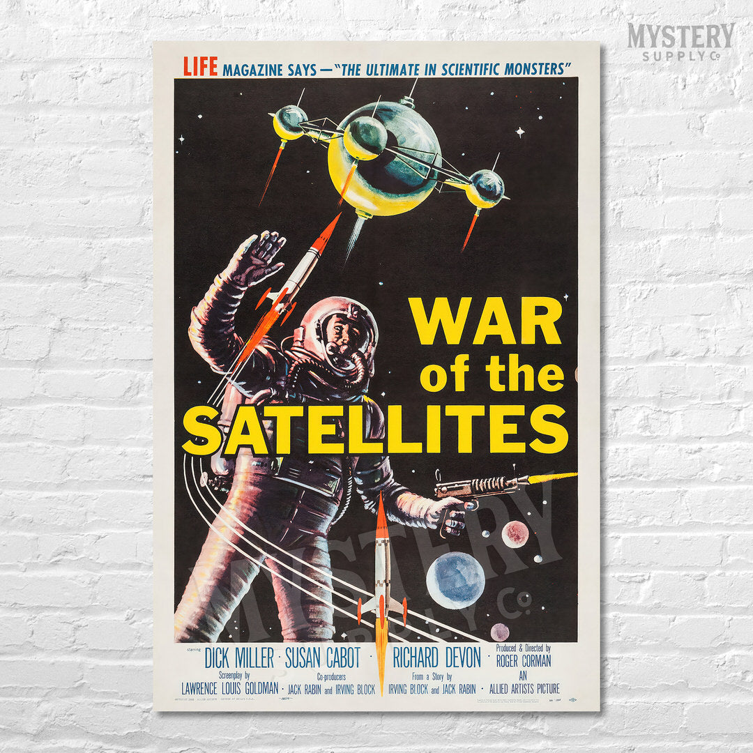 Vintage-style movie poster for 'War of the Satellites' with an astronaut and satellite on a white brick wall. From Mystery Supply Co. @mysterysupplycobackground.