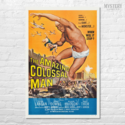 Vintage movie poster for 'The Amazing Colossal Man' on a white brick wall. From Mystery Supply Co. @mysterysupplyco