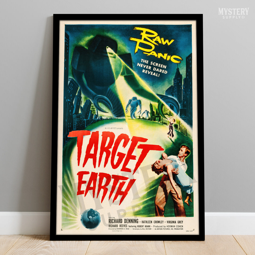 Vintage movie poster for 'Target Earth' with a green alien and text on a gray wall. From Mystery Supply Co. @mysterysupplyco