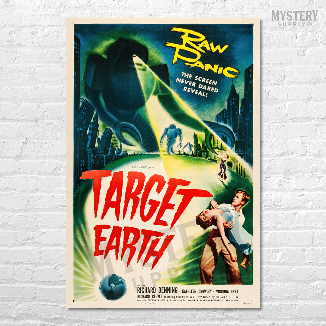 Vintage-style movie poster for 'Target Earth' with a large alien and cityscape on a white brick wall. From Mystery Supply Co. @mysterysupplyco