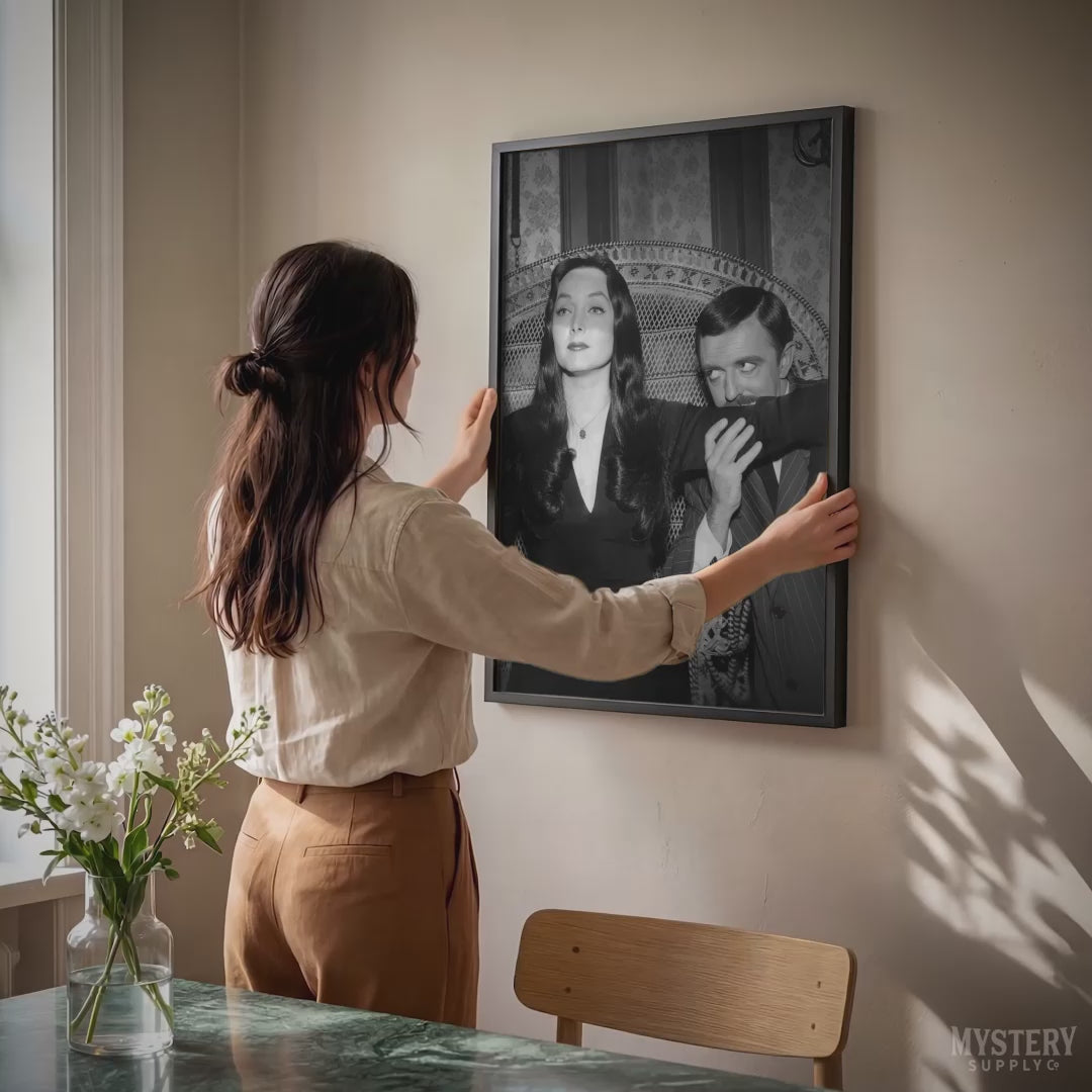 Morticia and Gomez 1960s Vintage Addams Family Black and White Photo Reproduction wall decor art print from Mystery Supply Co. @mysterysupplyco