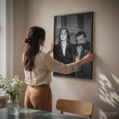 Morticia and Gomez 1960s Vintage Addams Family Black and White Photo Reproduction wall decor art print from Mystery Supply Co. @mysterysupplyco